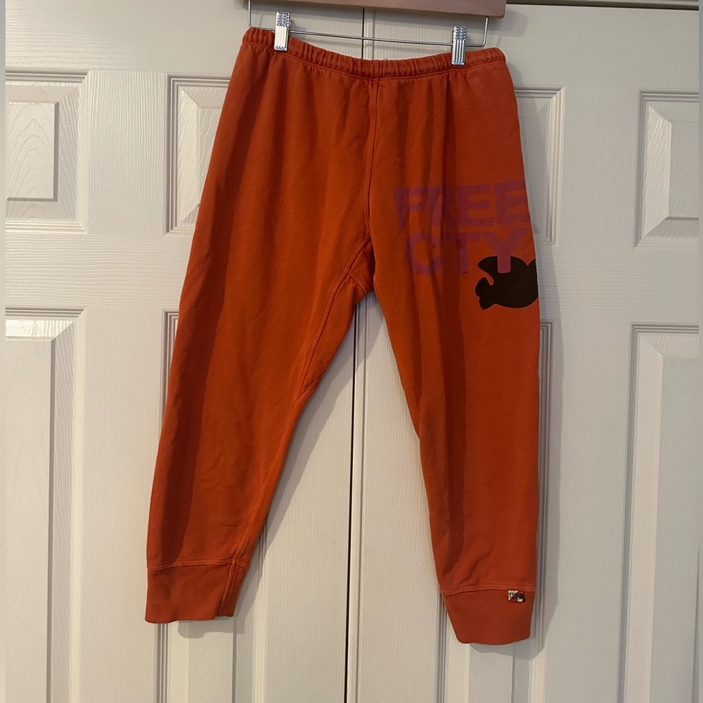 Freecity Orange Joggers with Purple Logo